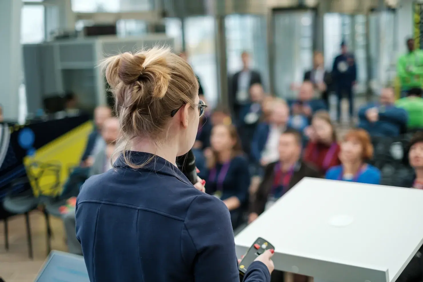 woman-speaking-to-audience